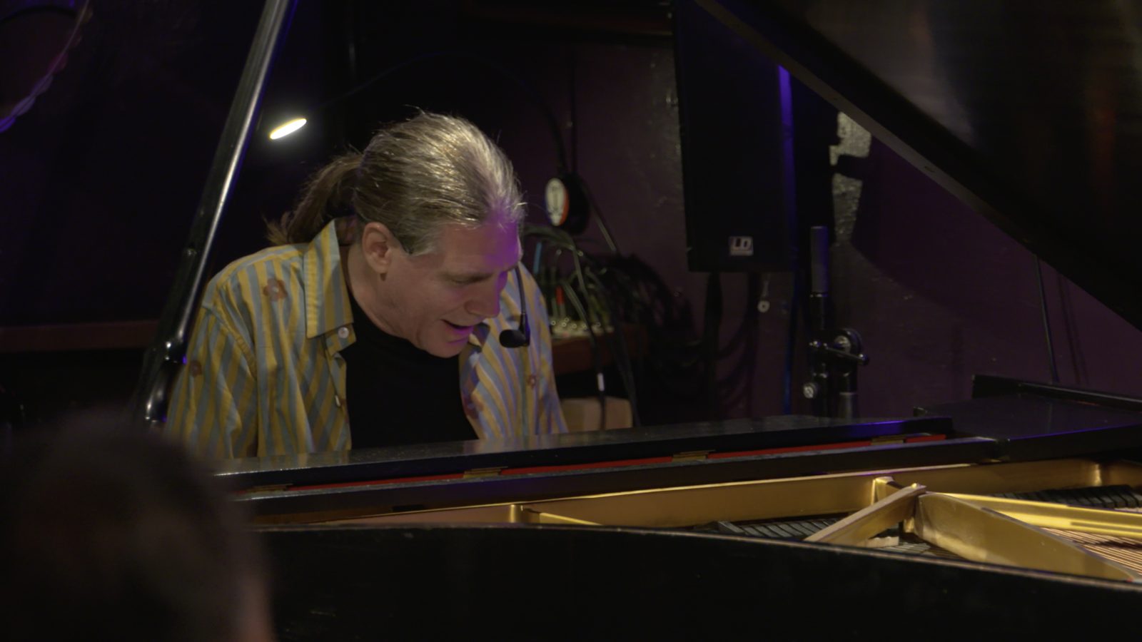 Ernie Savage at the grand piano
